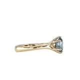 1.46ct Oval Precision Cut Montana Sapphire Low Profile Six Prong Split Shank Solitaire in 14k Yellow Gold