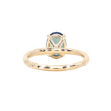 1.92ct Silky Teal Oval Nigerian Sapphire Evergreen Carved Solitaire in 14k Yellow Gold