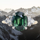 4.68ct Untreated Deep Teal Green Nigerian Oval Sapphire and Diamond Cluster Ring in Two Tone Platinum and 14k Yellow Gold