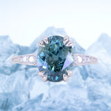 3.94ct Oval Unheated Deep Teal Blue Australian Sapphire Double Claw Prong Low Profile Milgrain and Diamond Ring in Platinum