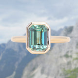 2.62ct Teal Green Emerald Cut Sapphire Low Profile Bezel Ring in 14k Yellow Gold