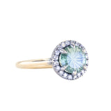 1.81ct Round Fantasy Carved Untreated Montana Sapphire and Antiqued Diamond Halo ring in 14k Yellow Gold