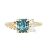 1.65ct Teal Blue Radiant Cut Madagascar Sapphire in Wandering Vine Low Profile 4 Prong Setting with Diamonds in 14k Yellow