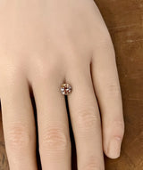 1.34CT PRECISION CUT ROUND BRILLIANT MONTANA SAPPHIRE, BICOLOR ORANGE-PINK, 6.5MM