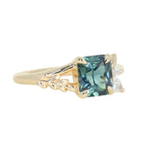 1.65ct Teal Blue Radiant Cut Madagascar Sapphire in Wandering Vine Low Profile 4 Prong Setting with Diamonds in 14k Yellow