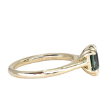 1.68ct Radiant Cut Teal Sapphire Cathedral Double Prong Solitaire in 18k Yellow Gold