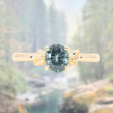 1.21ct Oval Blue Precision Cut Montana Sapphire Low Profile 4 Prong Leaf Bud Solitaire in 14k Yellow Gold