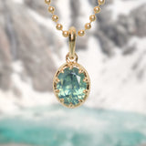 1.56ct Untreated Teal Green Nigerian Oval Sapphire 10 Prong Pendant in 14k Yellow Gold