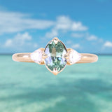 0.73ct Oval Unheated Montana Sapphire and Trillion Diamond Low Profile Ring in 14k Yellow Gold