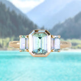 1.29ct Bezel Set Emerald Cut Untreated Montana Sapphire and Montana Sapphire Sides Three Stone Ring in 14k Yellow Gold