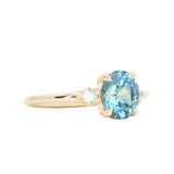 1.77ct Oval Precision Cut Parti Light Teal Montana Sapphire and Princess Cut Diamond Rapids Low Profile Ring in 14k Yellow Gold