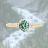 0.90ct Oval Light Blue Green Montana Sapphire and Princess Cut Diamond Rapids Low Profile Ring in 14k Yellow Gold