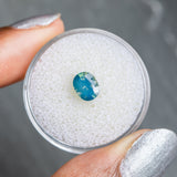 1.30CT OVAL GOMBE NIGERIAN SAPPHIRE, SILKY OPALESCENCE TEAL, 6.98X5.66X4.02MM, UNHEATED