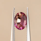 1.33CT OVAL SAPPHIRE, RASPBERRY PINK AND ORANGE , 7.30X5.33X4.08MM, UNTREATED