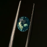1.21CT MADAGASCAR OVAL SAPPHIRE, UNTREATED, OPALESCENT PARTI LIGHT TEAL GREEN, 6.87X5.80X3.81MM