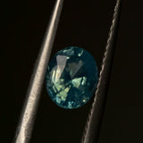 1.21CT MADAGASCAR OVAL SAPPHIRE, UNTREATED, OPALESCENT PARTI LIGHT TEAL GREEN, 6.87X5.80X3.81MM