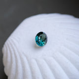 3.59CT OVAL MADAGASCAR SAPPHIRE, DEEP TEAL WITH GREEN, 9X7X4.9MM