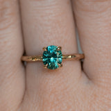 1.51ct Precision Cut Oval Teal Montana Sapphire Evergreen Carved Solitaire in 14k Yellow Gold