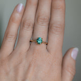 1.51ct Precision Cut Oval Teal Montana Sapphire Evergreen Carved Solitaire in 14k Yellow Gold