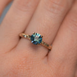 1.10ct Blue Round Madagascar Sapphire Evergreen Carved Solitaire in 14k Yellow Gold