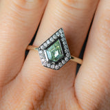 0.70ct Shield Cut Montana Sapphire and Blackened Gold Bezel Set Diamond Halo In 14k Green Gold