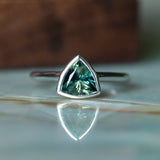 1.57ct Trillion Deep Teal Green Sapphire Contemporary Bezel Set Ring in 18k White Gold