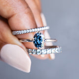 Blue Oval Moissanite Four Prong Compass Set Solitaire in 14k White Gold