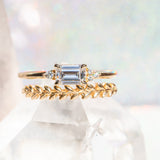 East-West Emerald cut Moissanite Asymmetrical Ring in 14k Yellow Gold