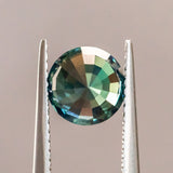 2.05CT ROUND MADAGASCAR SAPPHIRE, COLOR SHIFTING TEAL BLUE AND FOREST GREEN, 7.16X4.95MM