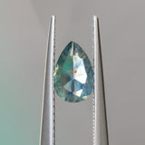 0.74CT PEAR SAPPHIRE, SILKY TEAL WITH ORANGE INCLUSION, 7.43X4.9MM