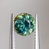 1.29CT ROUND MADAGASCAR SAPPHIRE, PARTI GREEN WITH LIGHT TEAL FLASHES, 6.2MM