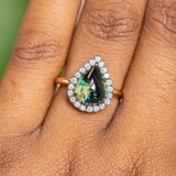 3.83ct Pear Cabochon Australian Sapphire and Blackened Halo ring in 18k Yellow Gold