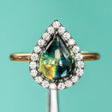 3.83ct Pear Cabochon Australian Sapphire and Blackened Halo ring in 18k Yellow Gold