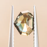 1.03CT SHIELD TANZANIAN SAPPHIRE, COLOR SHIFTING GREEN AND COGNAC, 6.6X5.5X3.7MM, UNTREATED