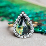 3.83ct Pear Cabochon Australian Sapphire and Blackened Halo ring in 18k Yellow Gold