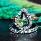 3.83ct Pear Cabochon Australian Sapphire and Blackened Halo ring in 18k Yellow Gold