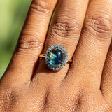 4.48ct Oval Cabochon Parti Sapphire and Blackened Halo ring in 18k Yellow Gold