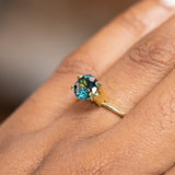 1.63CT ROUND NIGERIAN SAPPHIRE, PEACOCK GREEN, 7.01x4.50MM, UNTREATED