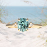 1.35ct Oval Brilliant Montana Sapphire and Princess Cut Diamond Rapids Low Profile Ring in 14k Yellow Gold