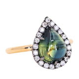3.83ct Pear Cabochon Australian Sapphire and Blackened Halo ring in 18k Yellow Gold