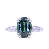4.26ct Oval Deep Teal Madagascar Sapphire Double Claw Prong Low Profile Milgrain and Diamond Ring in Platinum