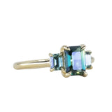 1.30ct Emerald Cut Madagascar Sapphire and 0.98ctw Montana Sapphire Three Stone Low Profile Ring in 18k Yellow Gold