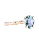 1.58ct Oval Untreated Light Blue Montana Sapphire Evergreen Carved 4 Prong Solitaire in 14k Yellow Gold