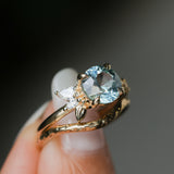 2.38ct Untreated Sky Blue Montana Sapphire in Wandering Vine Low Profile Four Prong Setting with Natural Diamonds in 14k Yellow Gold- Appraised Stone