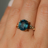 4.42ct Oval Blue Madagascar Sapphire in Wandering Vine Low Profile 4 Prong Setting with Diamonds in 14k Yellow Gold
