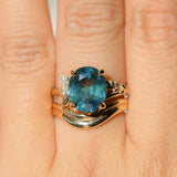 4.42ct Oval Blue Madagascar Sapphire in Wandering Vine Low Profile 4 Prong Setting with Diamonds in 14k Yellow Gold