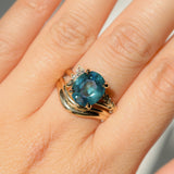 4.42ct Oval Blue Madagascar Sapphire in Wandering Vine Low Profile 4 Prong Setting with Diamonds in 14k Yellow Gold