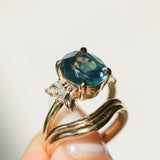 4.42ct Oval Blue Madagascar Sapphire in Wandering Vine Low Profile 4 Prong Setting with Diamonds in 14k Yellow Gold