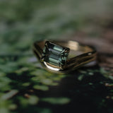 1.65ct Emerald Cut Color Shifting Madagascar Sapphire Prong Set Ripple Contour Solitaire in 14k Yellow Gold