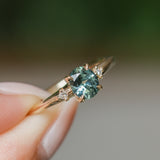 0.90ct Oval Light Blue Green Montana Sapphire and Princess Cut Diamond Rapids Low Profile Ring in 14k Yellow Gold